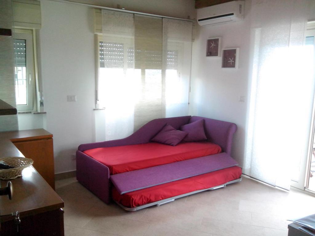 Pozzo Lazzaro Apartments Санта-Тереза-ди-Рива Номер фото
